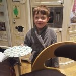 James tidying up breakfast plates
