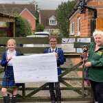 Henry & Tilly from St Margarets Prep present cheque to Patricia at SESAW